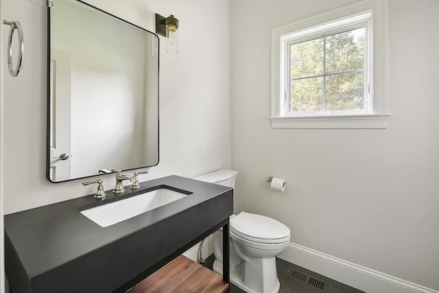 5 Bullens Way, Canton, MA 02021 - bathroom with toilet, vanity, and baseboards