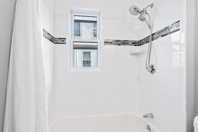 full bath featuring shower / bath combo with shower curtain