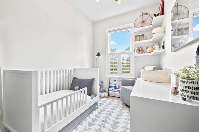 356 Bunker Hill St Unit 2, Boston, MA 02129 - bedroom with a nursery area