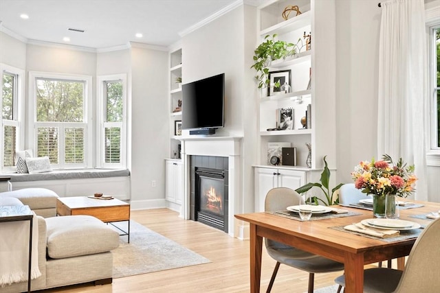 356 Bunker Hill St Unit 2, Boston, MA 02129 - living area featuring light wood-style floors, built in features, a fireplace, crown molding, and recessed lighting