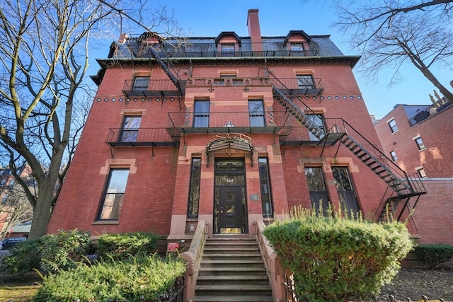 view of front of property with a balcony