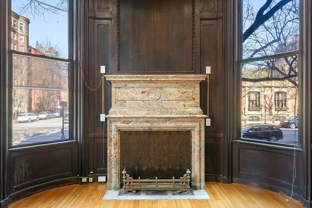 unfurnished living room with light hardwood / wood-style flooring