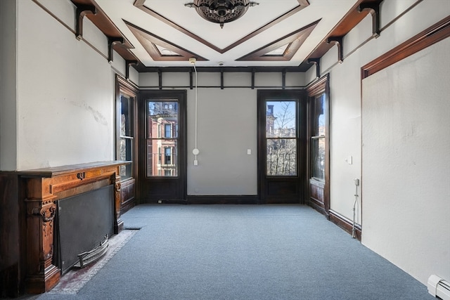 interior space featuring a raised ceiling, dark carpet, and baseboard heating