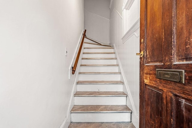 stairway with baseboards
