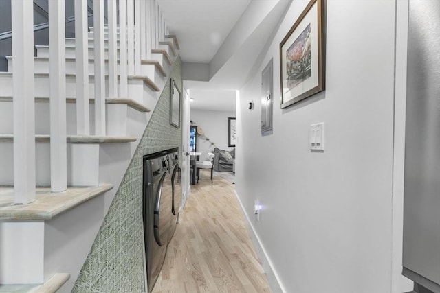 hallway with light wood-type flooring