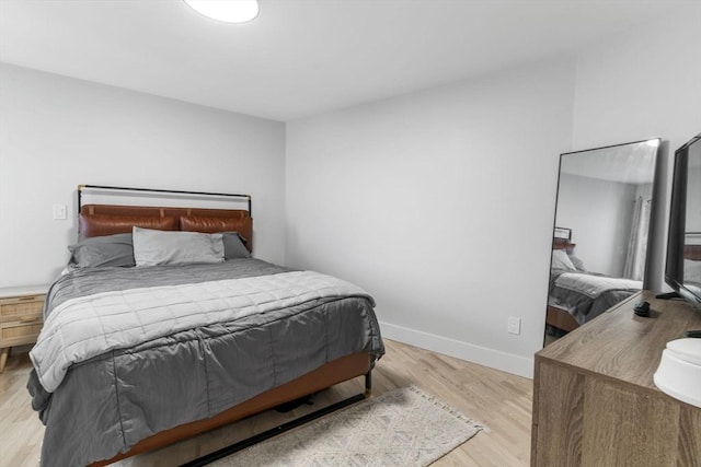 bedroom featuring light hardwood / wood-style flooring