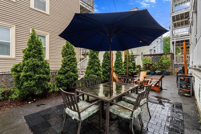view of patio featuring outdoor dining space