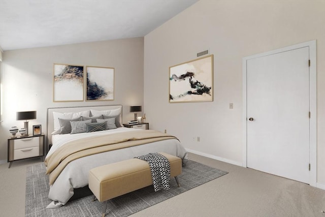 carpeted bedroom featuring lofted ceiling