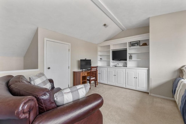 carpeted living room featuring vaulted ceiling with beams