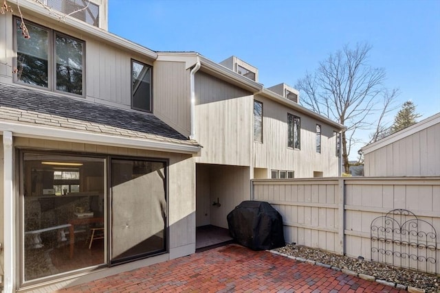 rear view of property with a patio area