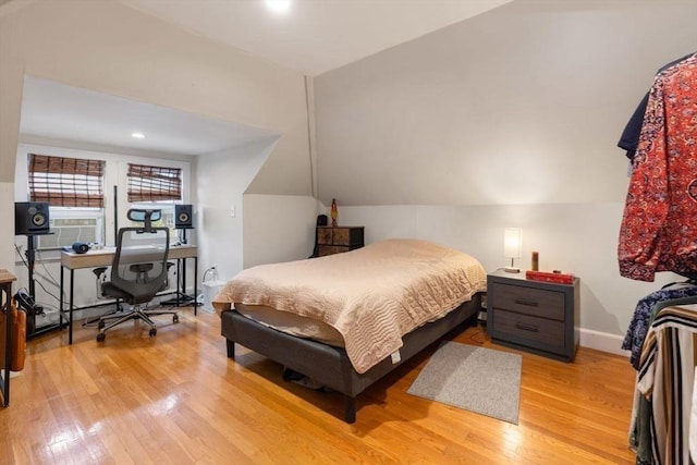 18-20 Presentation Rd, Boston, MA 02135 - bedroom with light wood-style floors, a desk, and vaulted ceiling