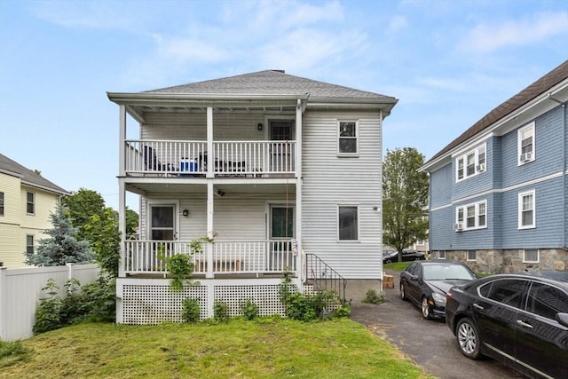 18-20 Presentation Rd, Boston, MA 02135 - view of front facade with a balcony and covered porch