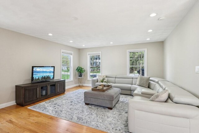 7 Acorn Way, Georgetown, MA 01833 - living room with light wood finished floors, recessed lighting, and baseboards