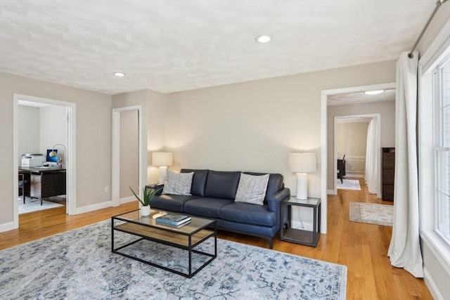 7 Acorn Way, Georgetown, MA 01833 - living room with light wood-style flooring, baseboards, recessed lighting, and an office area