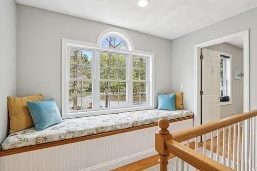 7 Acorn Way, Georgetown, MA 01833 - sitting room featuring healthy amount of natural light and wood finished floors