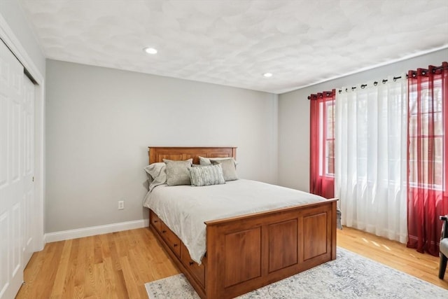 7 Acorn Way, Georgetown, MA 01833 - bedroom featuring light wood-style flooring, recessed lighting, baseboards, and a closet