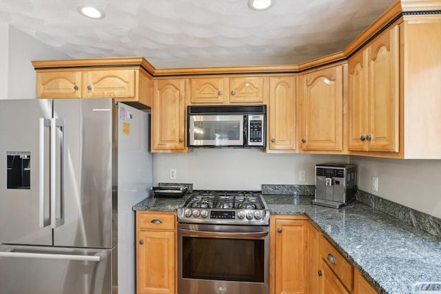 7 Acorn Way, Georgetown, MA 01833 - kitchen with appliances with stainless steel finishes, dark stone counters, and recessed lighting