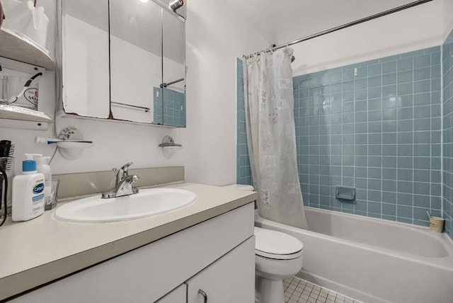 full bathroom with tile patterned floors, toilet, shower / bath combo with shower curtain, and vanity