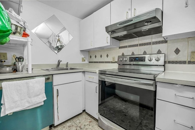 kitchen featuring white cabinetry, appliances with stainless steel finishes, sink, and backsplash