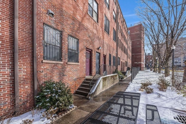 view of snow covered property