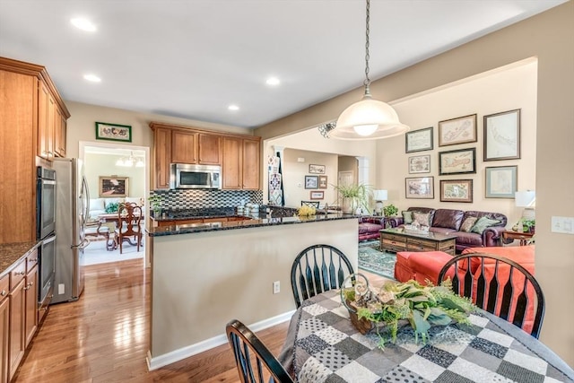 29 Shinglewood, Plymouth, MA 02360 - dining room featuring light wood-style floors and recessed lighting