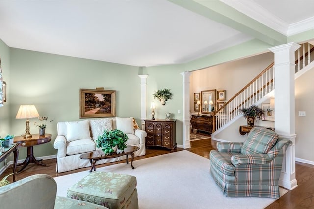 29 Shinglewood, Plymouth, MA 02360 - living room featuring decorative columns, wood finished floors, stairs, and ornamental molding