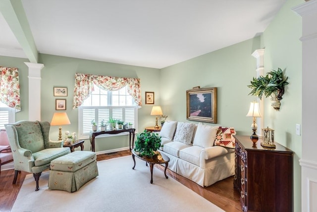 29 Shinglewood, Plymouth, MA 02360 - living area featuring wood finished floors and ornate columns