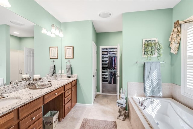 29 Shinglewood, Plymouth, MA 02360 - full bath with a bath, double vanity, tile patterned flooring, a spacious closet, and baseboards