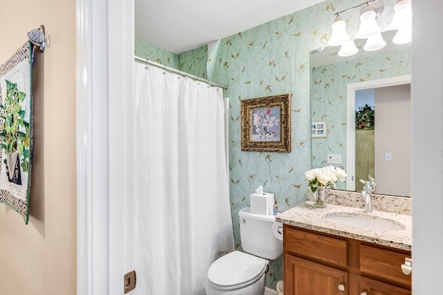 29 Shinglewood, Plymouth, MA 02360 - bathroom with wallpapered walls, vanity, toilet, and a shower with shower curtain