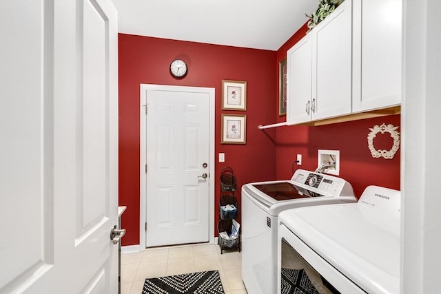 29 Shinglewood, Plymouth, MA 02360 - clothes washing area featuring washer and clothes dryer, cabinet space, light tile patterned floors, and baseboards