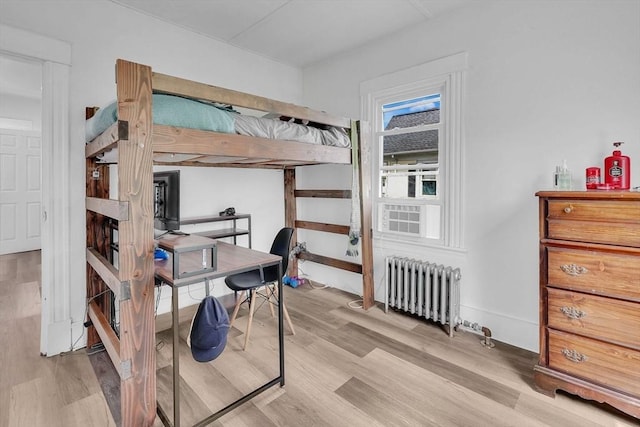 37 Revere St, Springfield, MA 01108 - bedroom featuring radiator and wood finished floors