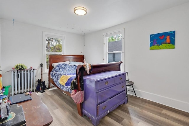 37 Revere St, Springfield, MA 01108 - bedroom featuring multiple windows, light wood-type flooring, and baseboards