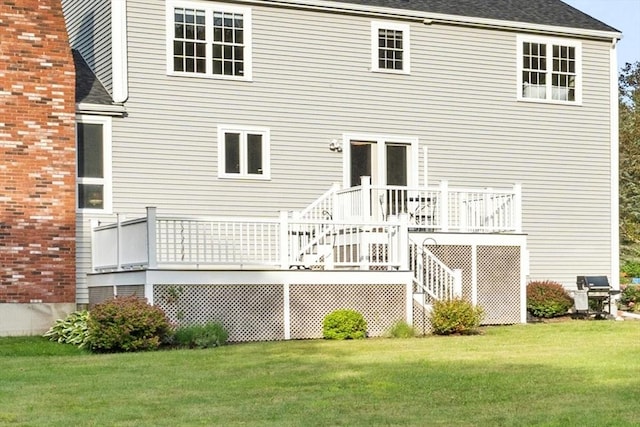 3 Penni Ln, Andover, MA 01810 - rear view of property featuring a lawn, a wooden deck, and stairs