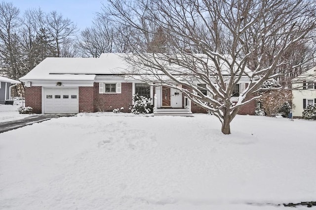 view of front of property featuring a garage