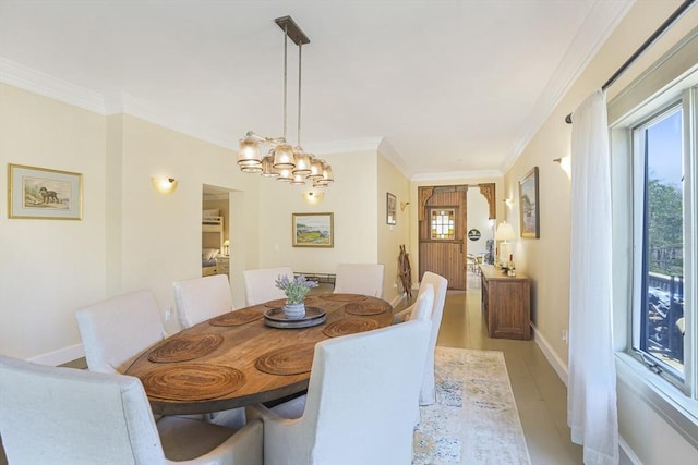 79 David Ave, Tisbury, MA 02568 - dining area with ornamental molding, baseboards, and a chandelier