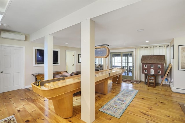 79 David Ave, Tisbury, MA 02568 - interior space with a wall mounted AC, wood-type flooring, recessed lighting, baseboards, and baseboard heating