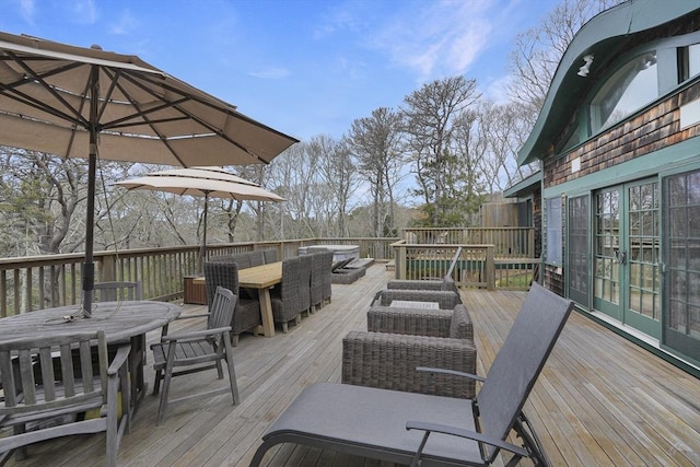 79 David Ave, Tisbury, MA 02568 - wooden deck with outdoor dining area and french doors