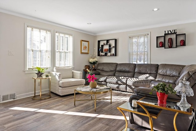 living room featuring ornamental molding and hardwood / wood-style floors