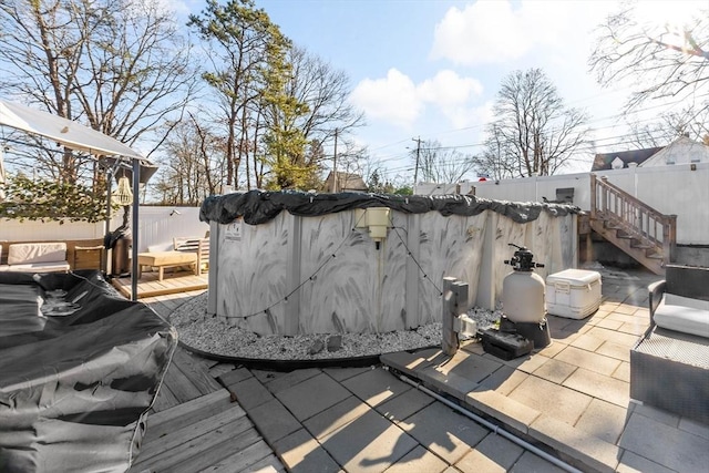 wooden deck featuring a patio area