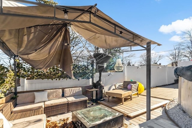 wooden deck with an outdoor living space