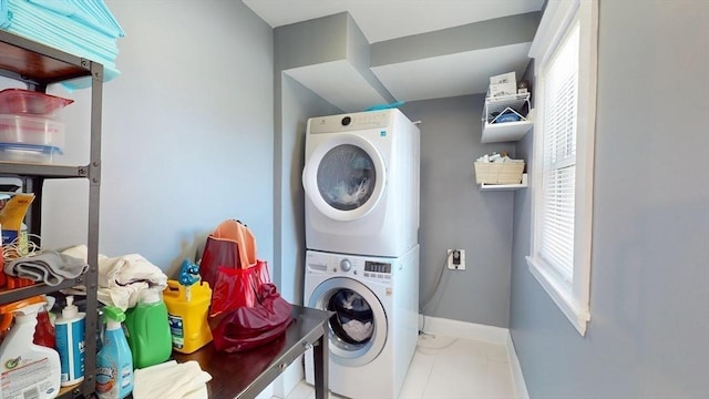 33 Jarvis St, Revere, MA 02151 - laundry room with estacked washer and dryer and baseboards