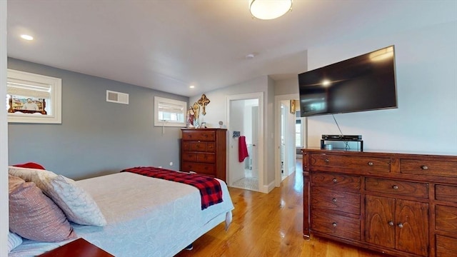 33 Jarvis St, Revere, MA 02151 - bedroom featuring light wood finished floors, vaulted ceiling, and recessed lighting
