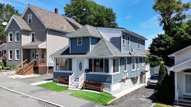 33 Jarvis St, Revere, MA 02151 - view of front of home featuring roof with shingles