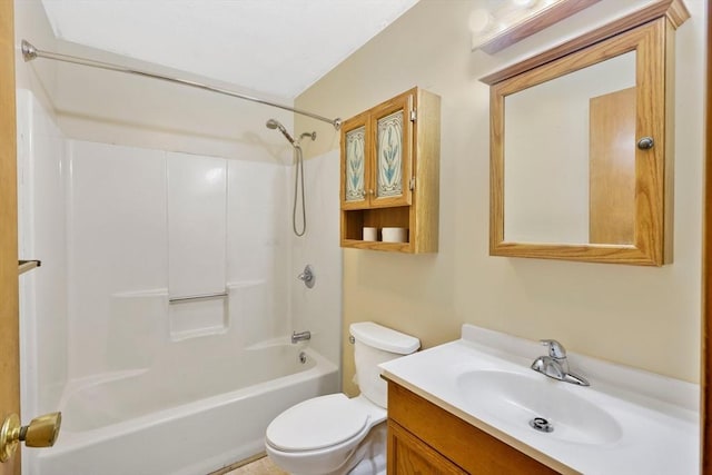 bathroom with toilet, shower / bathtub combination, and vanity