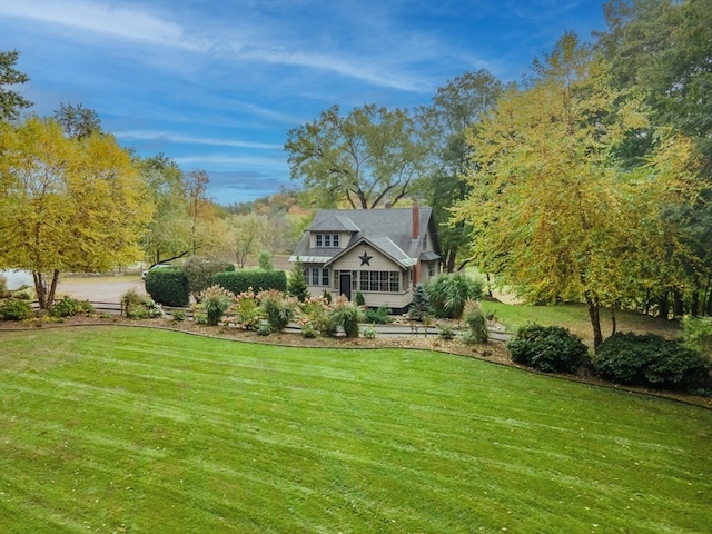 view of front of home with a front yard