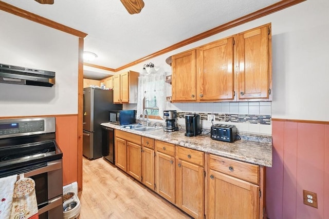 6 Hart Ave, Taunton, MA 02780 - kitchen with black appliances, under cabinet range hood, a sink, crown molding, and a wainscoted wall