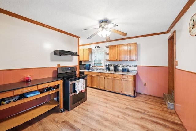 6 Hart Ave, Taunton, MA 02780 - kitchen featuring range with two ovens, wainscoting, exhaust hood, a sink, and black microwave