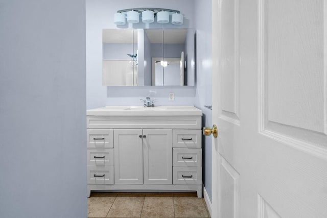 bathroom with vanity and tile patterned floors