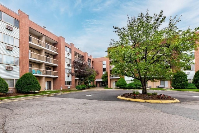 4975 Washington St Unit 313, Boston, MA 02132 - view of apartment building / complex