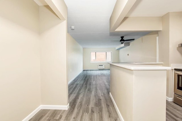 4975 Washington St Unit 313, Boston, MA 02132 - hallway with wood finished floors and baseboards